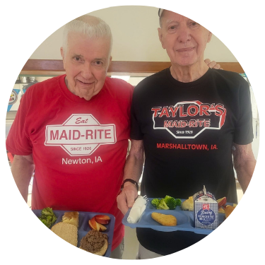 Men Holding Food Trays