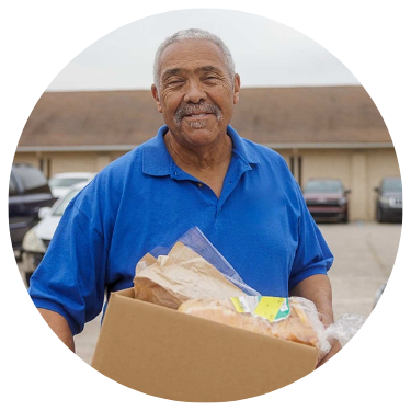 Man Holding Food Items